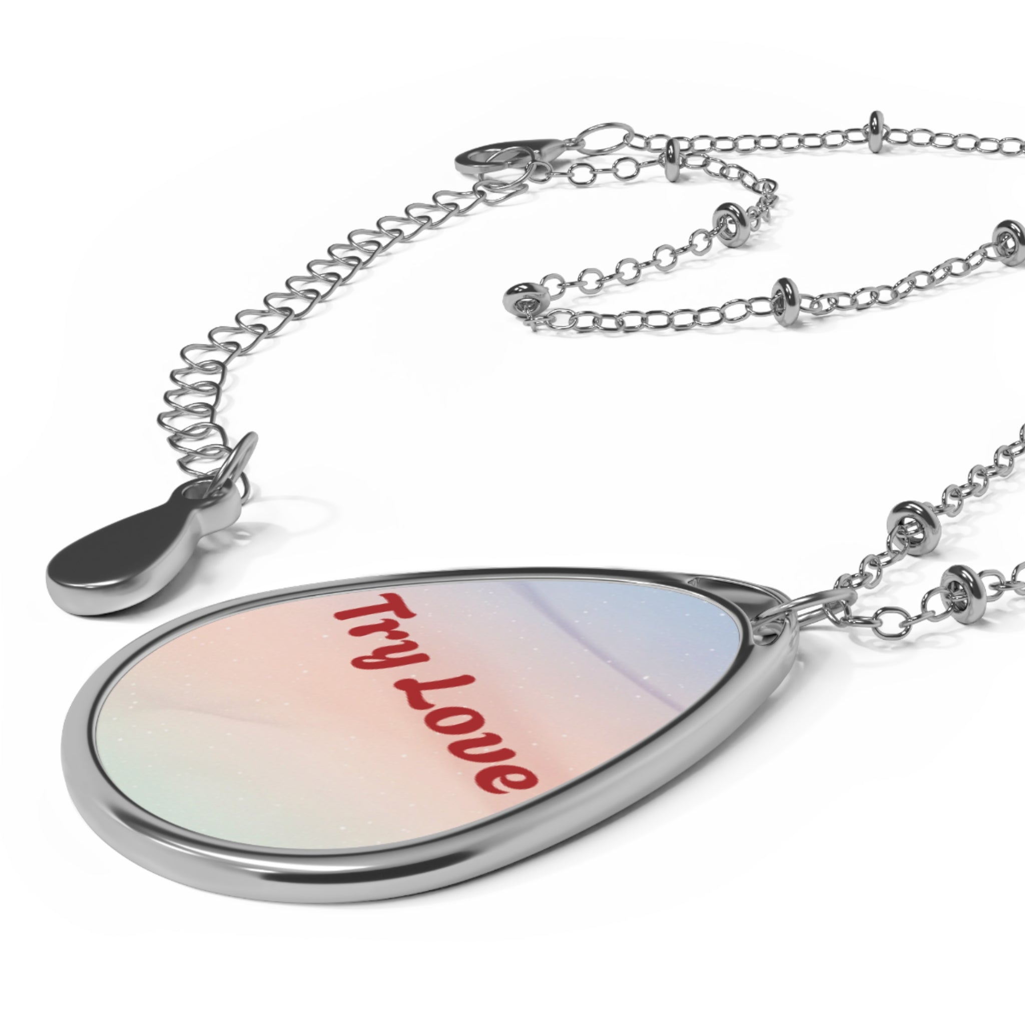 Iridescent Oval Pendant Necklace — Sterling Teardrop Locket with subtle suggestion to Try Love as a way to be.