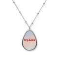 Iridescent Oval Pendant Necklace — Sterling Teardrop Locket with subtle suggestion to Try Love as a way to be.